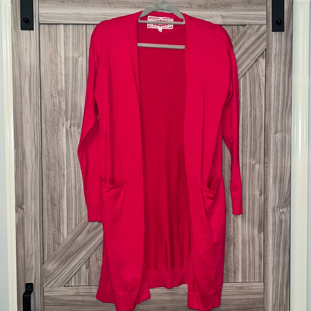 19. PINK MARTINI hot pink cardigan